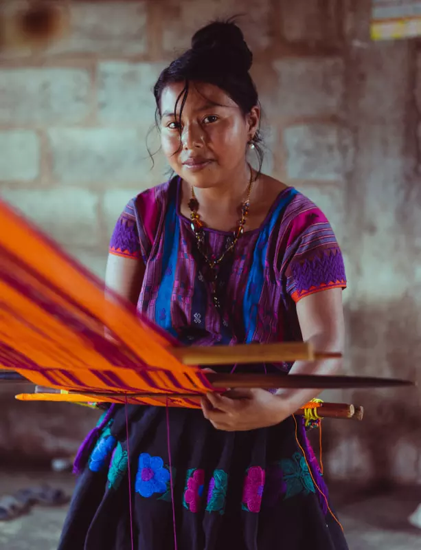 Woman working traditional textiles 