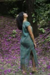 Woman wearing Guerrero Teal Green Dress by montsera