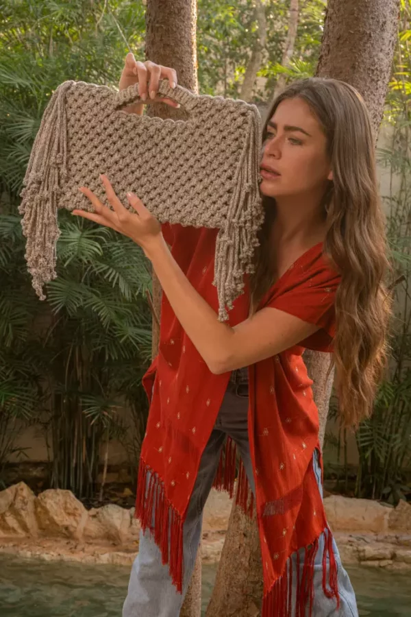 Woman holding Paty Sand bag