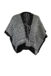 Paula black white and black cape 