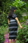 Woman wearing Universo Black Mini dress