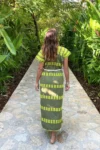 Woman wearing Universo Green Kaftan by montsera