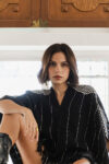 Itzamna Poncho model Woman with Itzamna Poncho Montsera Collective