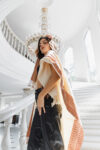 Beautiful Woman wearing Kiin Cape Monstera