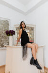 Mini black dress with fringe sophisticated look handmade in mexico by artisans contemporary fashion ethical work