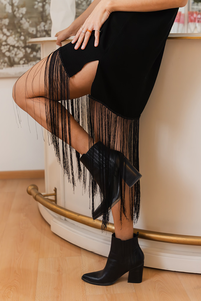 Mini black dress with fringe sophisticated look handmade in mexico by artisans slow fashion sustainable fabrics