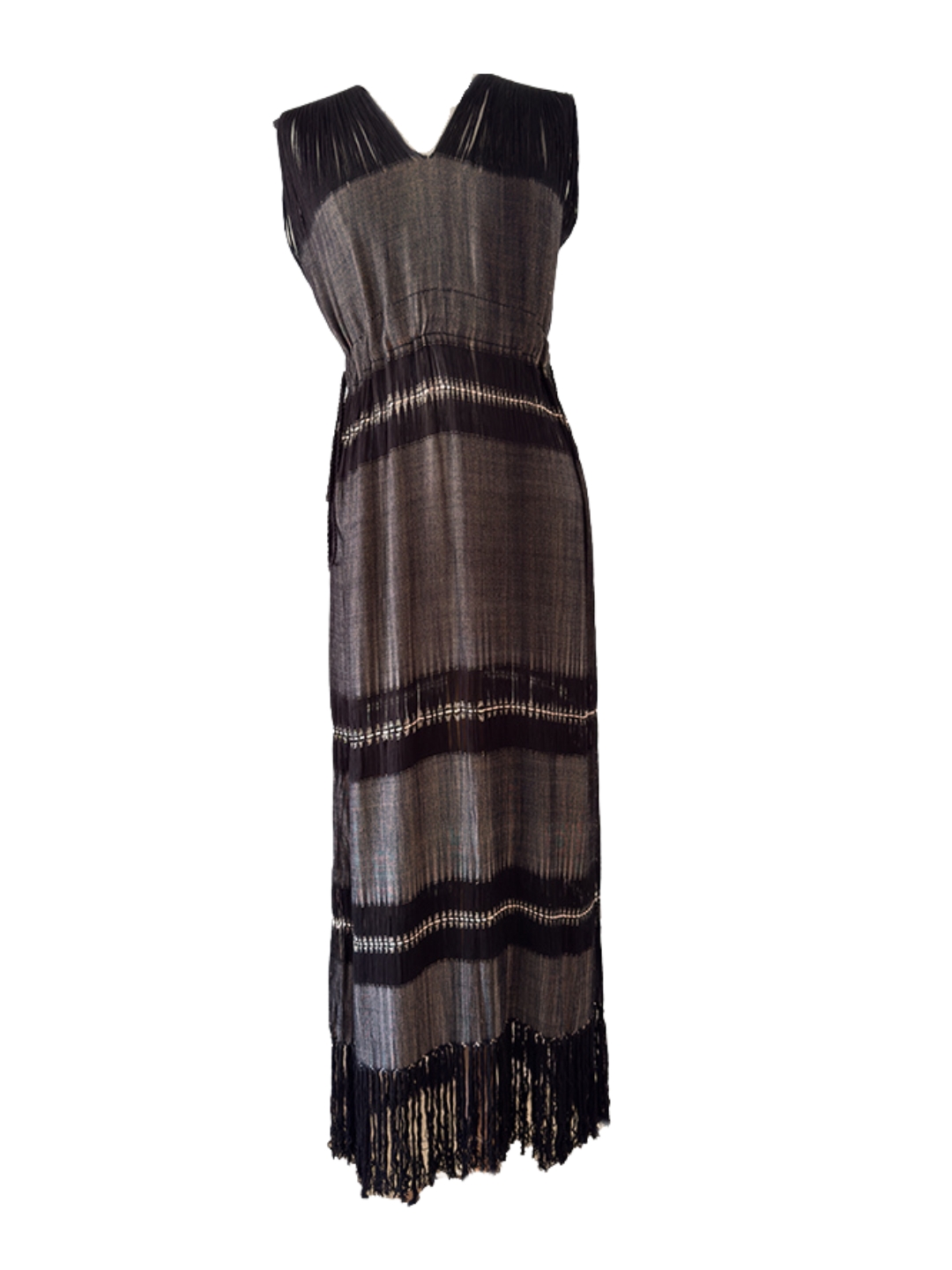 Full-length image of the Mezcal Maxi Dress on white background, showing fringe detail, drawn thread accents, and cinched waist belt.
